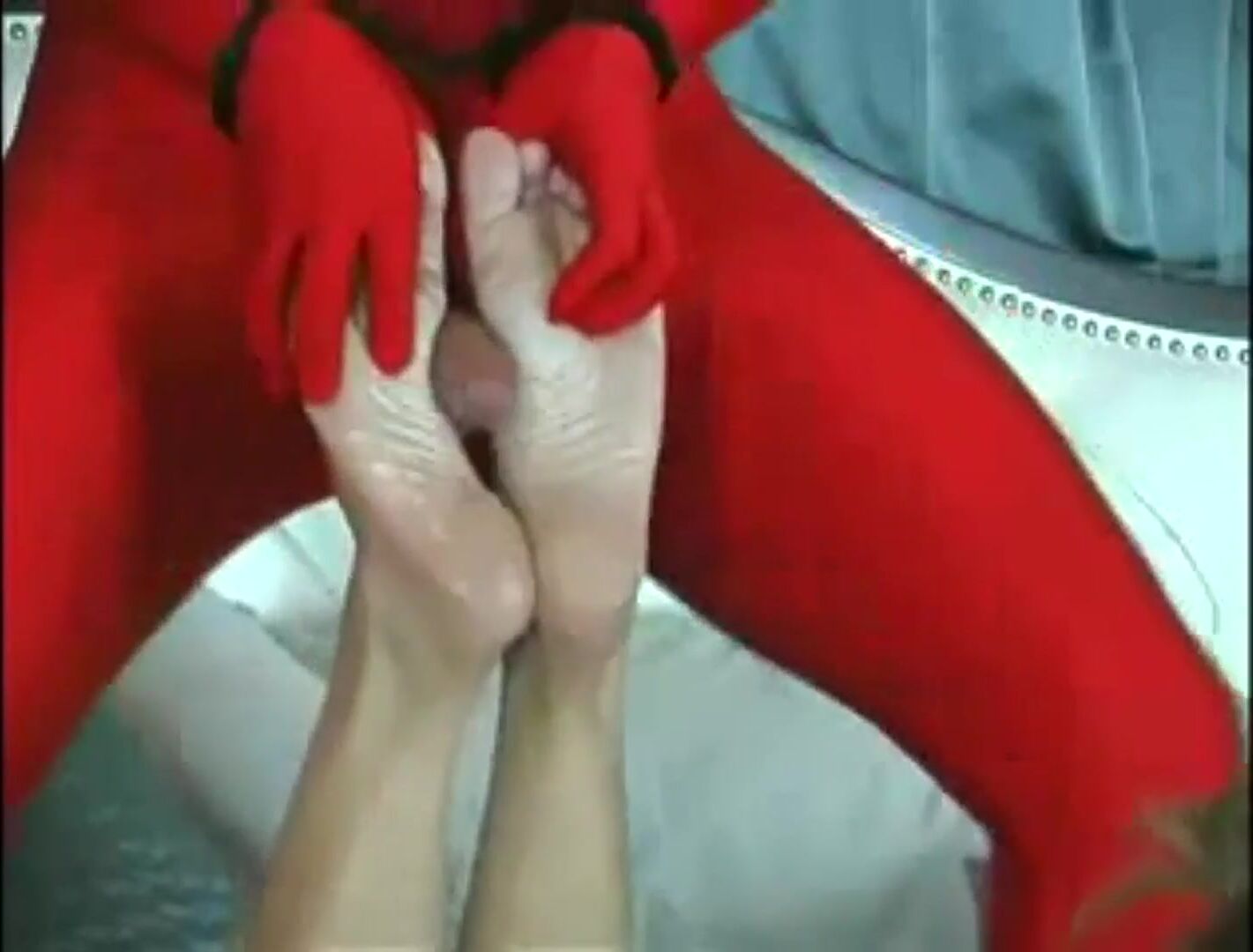Spider-man cums on her feet
